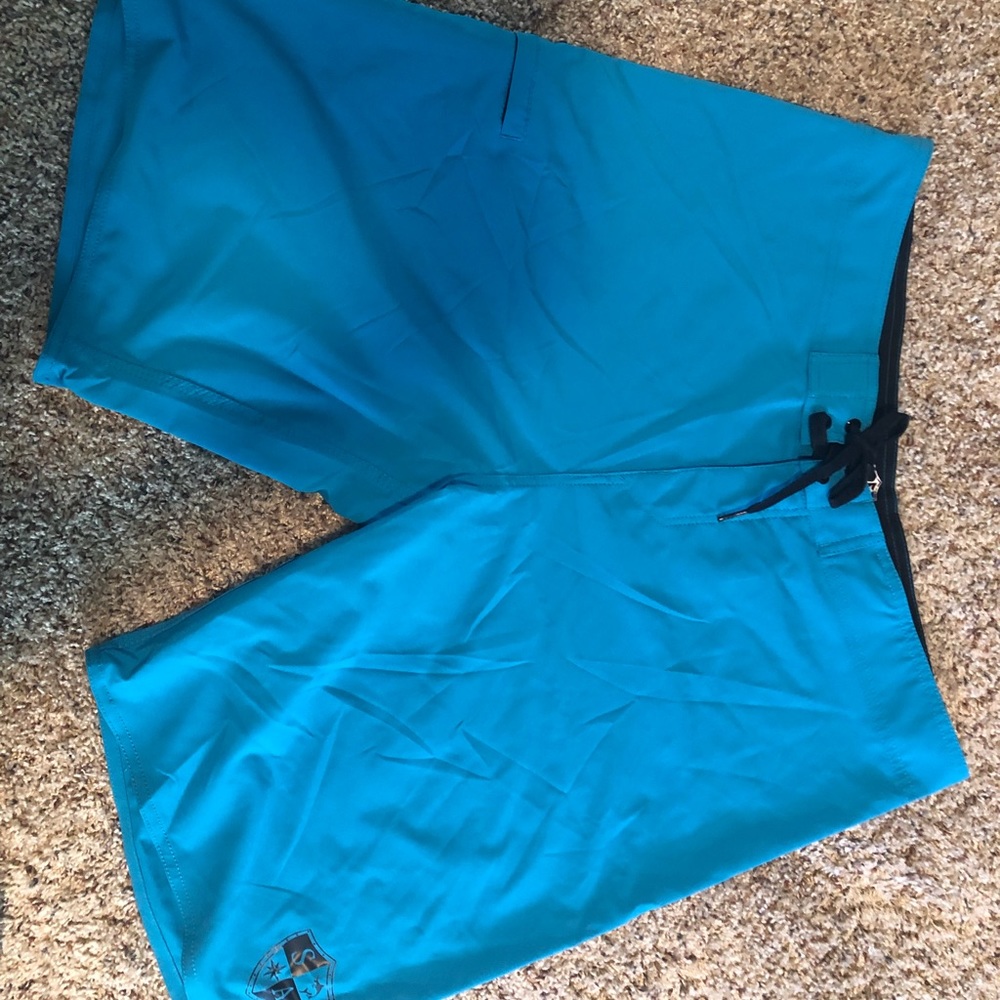 SA Co. swim trunks